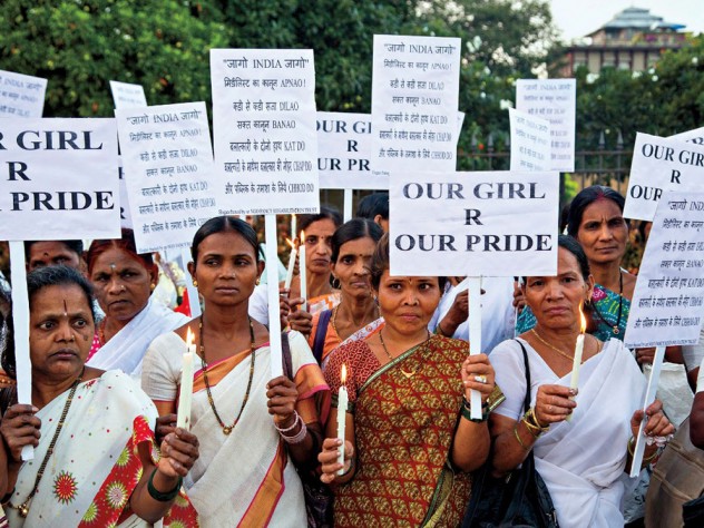 Photograph © Holger Leue/Corbis Rallying against rape: a candlelight protest in Mumbai, December 2013