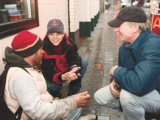 Even as BHCHP president, O’Connell spends time on the street. Here, he and physician assistant Jill Roncarati check on a homeless man.