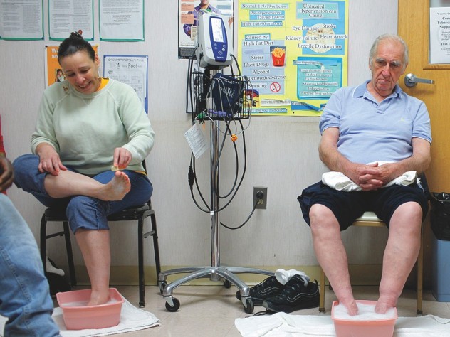 Patients at the BHCHP foot clinic, where other basic services, such as blood-pressure and diabetes checks, are available as well.