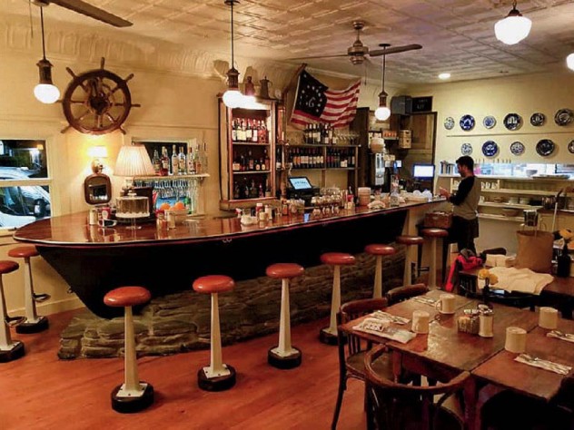 Photograph showing a restaurant bar made from a vintage dory