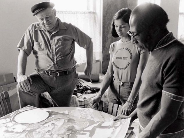 A 1975 photo of Bearden (at left) in his studio with photographer Jeanne Moutoussamy and master printmaker Robert Blackburn