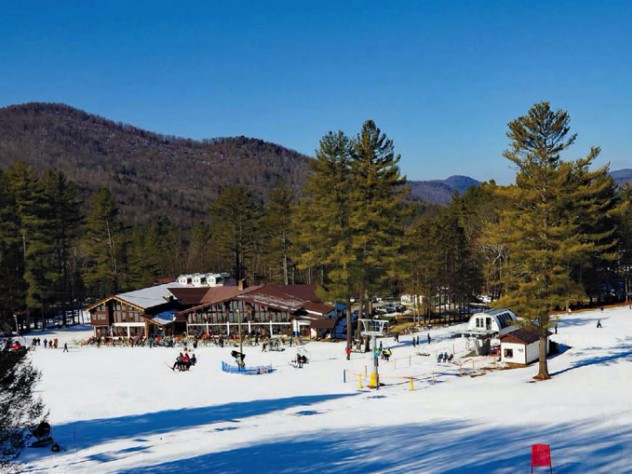 Snowy view of Berkshire East's warming lodges and restaurant