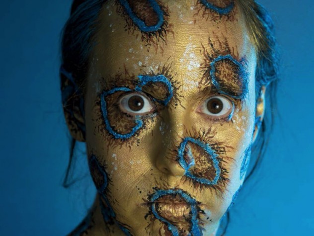 Shelby Meyerhoff's photographic self-portrait of her head and shoulders transformed with body paints into a blue-ringed octopus