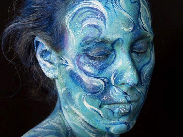 Meyerhoff's self-portrait as “ocean waves”—with blue hair, blue skin, and blue and white swirls indicating waves