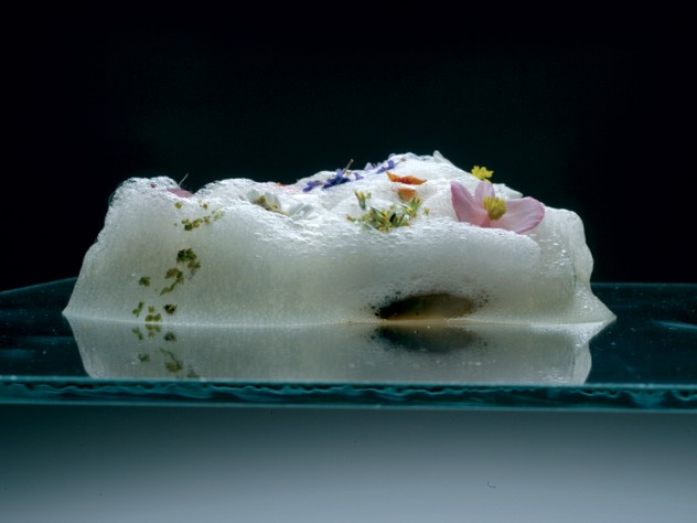 This dish, "air of honey with flowers and pistachio nuts," uses another Adrià trademark, culinary foam.