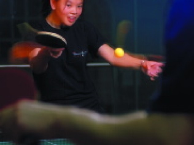 "Two-winged looper" Kyna Fong demonstrates her topspin backhand.