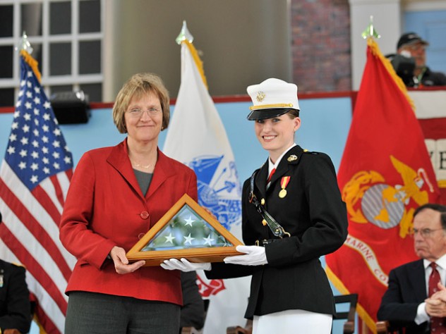 Photograph by Stu Rosner After her speech, President Faust received an American flag (previously flown over Harvard Yard and the ROTC unit’s MIT headquarters) from U.S. Marine Corps cadet Shawna L. Sinnott on behalf of all the cadets.
