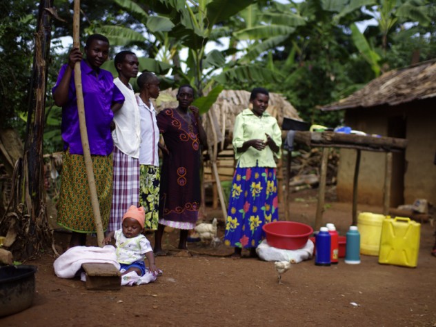 Photograph by Ian MacLellan Brooks's work in Uganda also involved writing skits for a community theater troupe that educates about health through its performances. Here, the troupe rehearses.