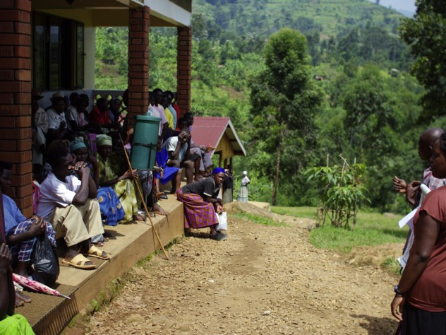 Photograph by Ian MacLellan Patients waiting at the Beatrice Tierney Health Center listen to a lesson about malaria.