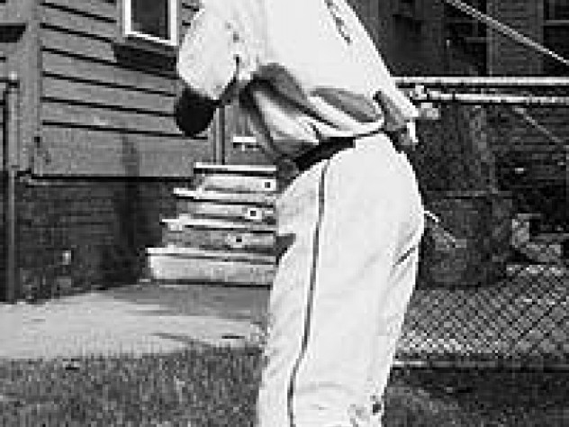 Nicholas Dawidoff, in uniform here with bat at the ready at the age of 11, describes his devotion to the Red Sox in a new memoir. 