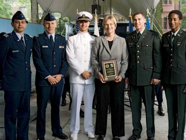 At the ROTC ceremony, from left to right: U.S. Air Force second lieutenants Roberto A. Guerra and Michael J. Arth, U.S. Navy ensign John D. Reed, President Faust, and U.S. Army second lieutenants Jason M. Scherer and J. Danielle Williams.