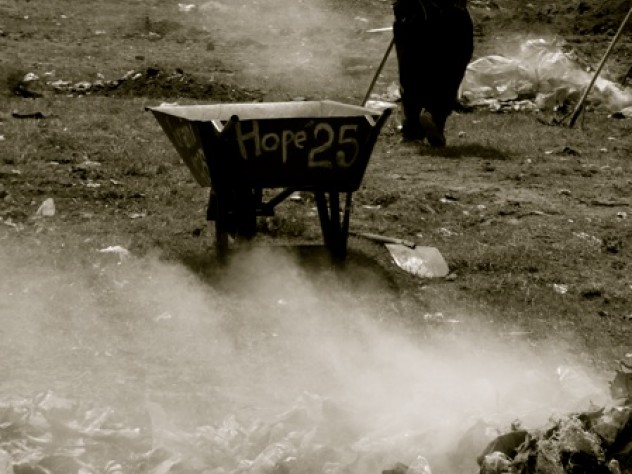 Photograph by Megan Shutzer While Shutzer was doing research at Pipeline, the residents spent a day gathering up trash and burning it, in an effort that spoke of hope for the future—and of the permanence of what was supposed to be a temporary home.