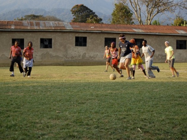 Courtesy of Megan Shutzer As part of the 2008 program studying conservation, Shutzer and other American students lived in Bangata, a town in northern Tanzania, for three weeks. Here, Shutzer takes the ball in a “USA v. Tanzania” soccer match that pitted the American students against girls from Bangata.