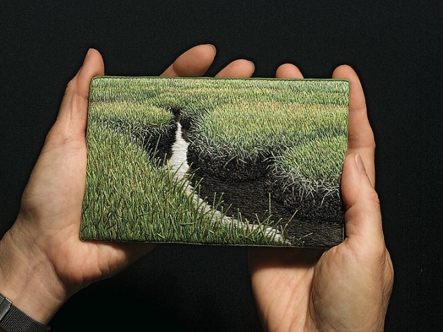 The artist holds <i>Summer Salt Marsh</i> (2008).