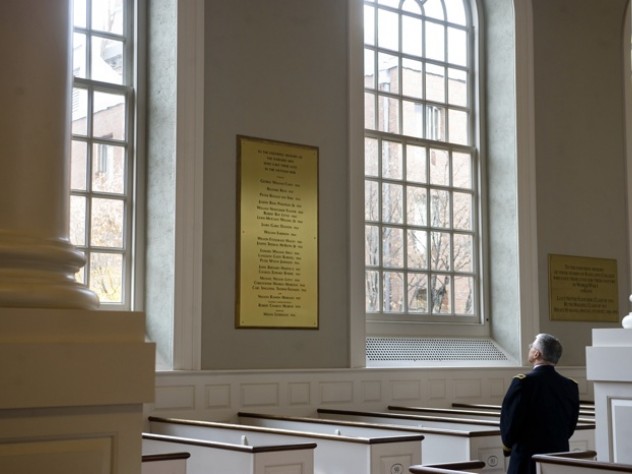 Photograph by D. Myles Cullen/Courtesy of U.S. Army U.S. Army Chief of Staff George W. Casey Jr. views the plaque in Memorial Church honoring Harvard’s Vietnam War dead—among them his father, George W. Casey ’45.