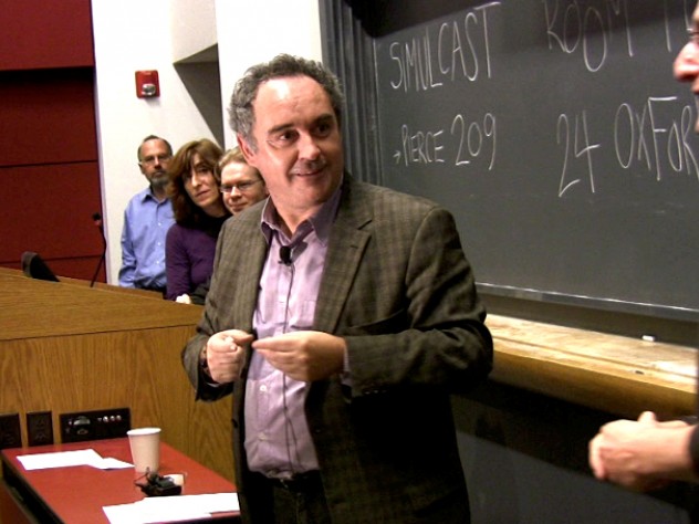Ferran Adrià, dubbed the father of molecular gastronomy, pauses to let molecular geneticist Roberto Kolter (at right) translate during Adrià’s public lecture at Harvard.