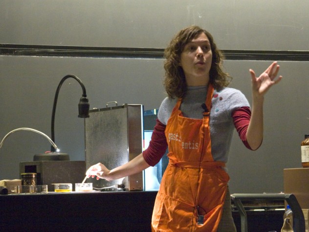 Eliza Grinnell/SEAS Amy Rowat stirs cocoa powder into cocoa butter to show that the two substances don't blend easily.