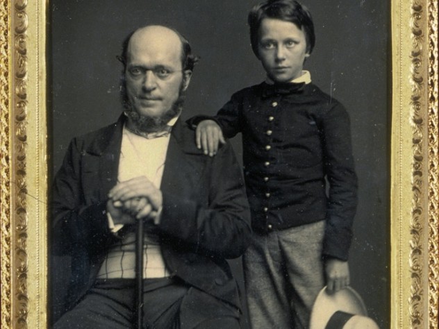 Courtesy of the Houghton Library, Harvard University. Henry James Sr. poses with his son Henry Jr. at Mathew Brady’s studio in New York City, 1854.