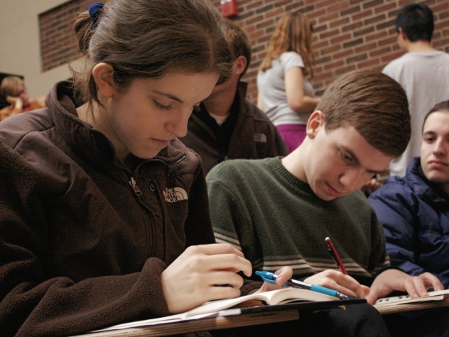 Brenda Lin Sophomore Meryl Federman and senior Adam N. Hallowell keep themselves busy during a break in the action at Brown University’s early fall tournament.