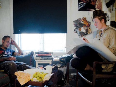 In a still from "The Painter and the Thief," the male thief watches the female artist at work.