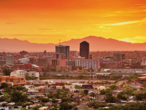 Photograph of the Tucson, Arizona, skyline and downtown taken at sunset.