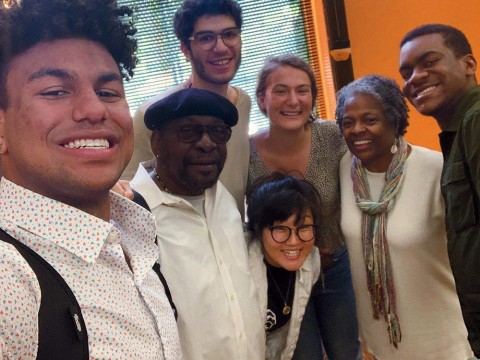 A group photo of the four Harvard undergraduates, including the author, with their project adviser and two local, older mentors
