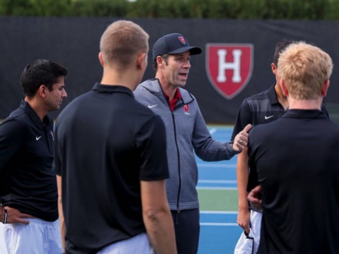 Andrew Rueb speaks to members of his team.