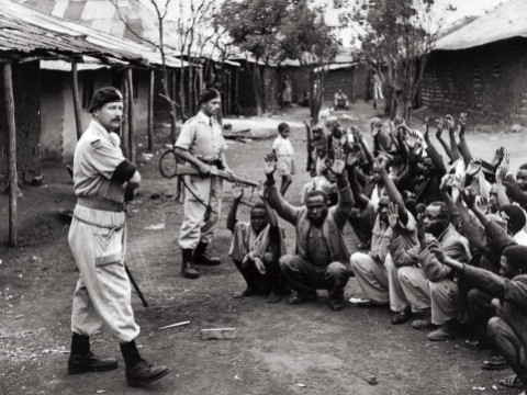 British soldiers and local police searching homes to interrogate subjects during Mau May rebellion, c. 1954