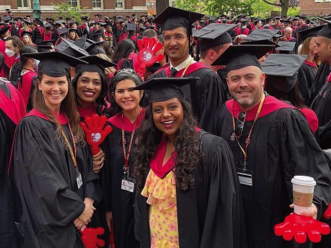 Harvard students in caps and gowns 