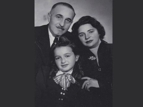 Susan Rubin Suleiman with her parents in 1949; her mother is wearing the silver pin discussed in the book excerpt.