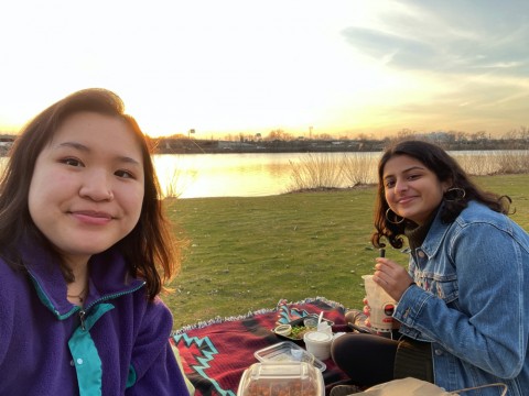 Meena Venkataramanan (pictured right) and her friend Britney (pictured left) on the blanket at Magazine Beach. 