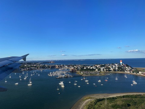 Photograph of boats at anchor on the approach to Boston’s Logan Airportn