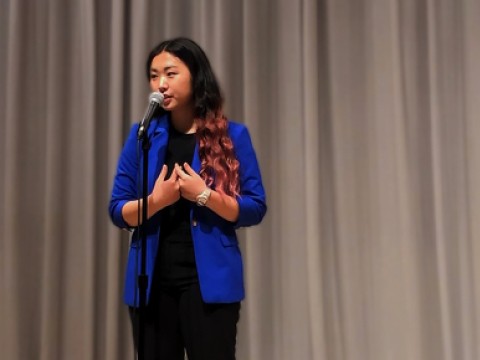 Catherine Yeo performing on stage
