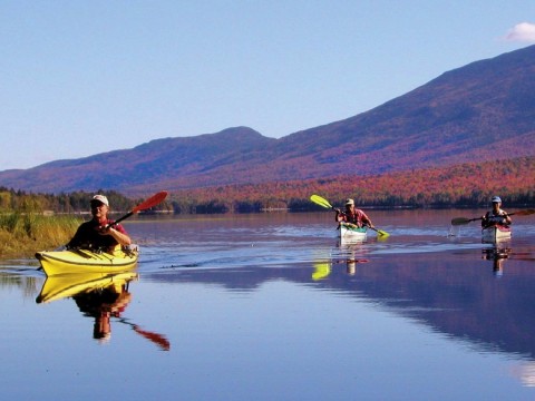 Paddlers enjoy the serenity of Flagstaff Lake, Maine.