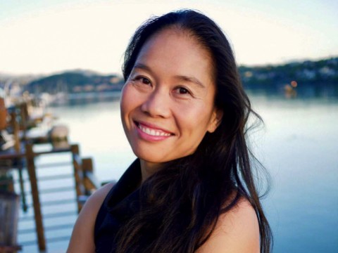 Bonnie Tsui Photo of Bonnie Tsui standing on a pier