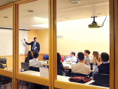 Gawande at his weekly meeting with his research team, discussing initiatives to improve surgical safety