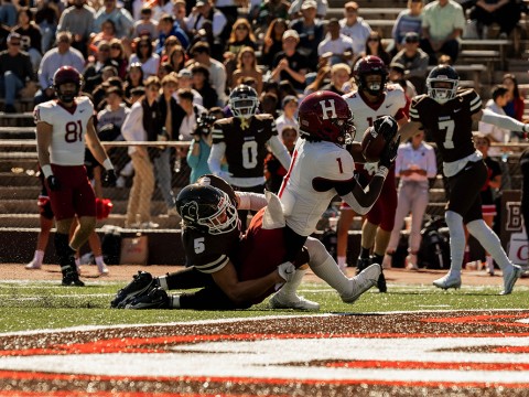 Harvard’s Kym Wimberly scores his second touchdown.