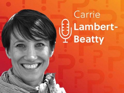 Carrie Lambert-Beatty headshot over an orange background. 