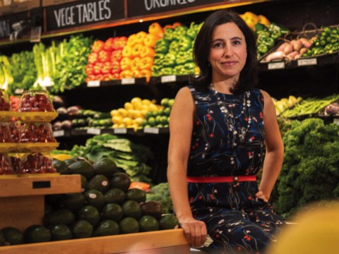 Emily Broad Leib in front of produce 