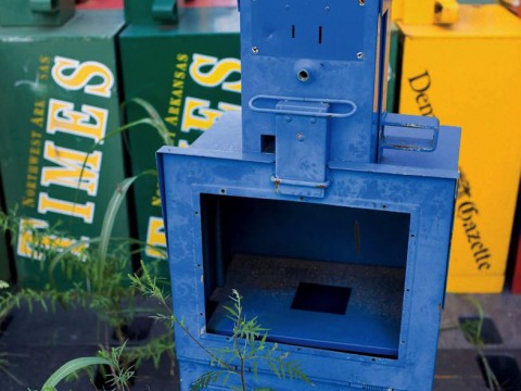 Photo of abandoned newspaper vending boxes
