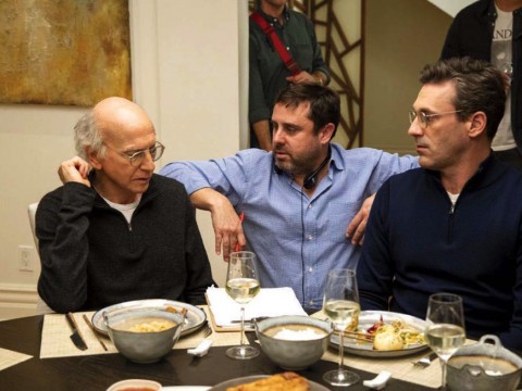 Producer Jeff Schaffer sits between star Larry David (left) and another cast member on the “Curb Your Enthusiasm” set.