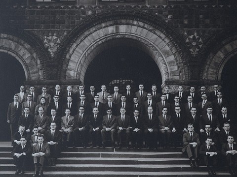 Formal portrait of the Board of Editors for volume 70 of the “Harvard Law Review” (1956-1957), photographed on the steps of Austin Hall. The author, only the third woman admitted to Review membership, stands in the fourth row, at upper left.