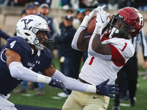 Wideout Kym Wimberly hauls in Luke Emge’s third-down, last-seconds, no-timeouts pass to secure Harvard’s thrilling 31-27 victory in The Game. 