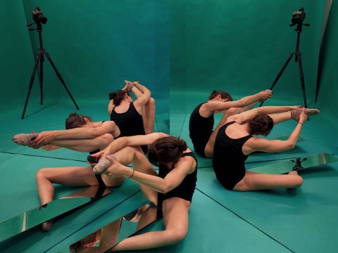 Repeated images of a ballet dancer warming up amid a teal background