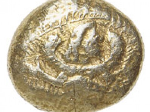 The earliest coin among Harvard’s holdings, dating from 600-550 b.c., this rather battered specimen, made of electrum, shows on the obverse a bearded, winged figure. This makes it unique, the only extant coin of the period bearing a human image. Where it was made is not known, but it is similar in other respects to coins that were widely issued at the very beginnings of coinage, about 630 B.C., in western Asia Minor and cities on the Greek coast.
