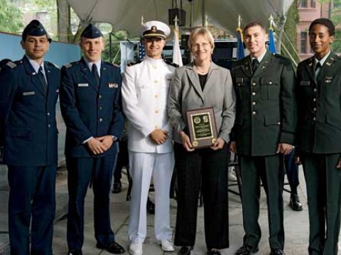 At the ROTC ceremony, from left to right: U.S. Air Force second lieutenants Roberto A. Guerra and Michael J. Arth, U.S. Navy ensign John D. Reed, President Faust, and U.S. Army second lieutenants Jason M. Scherer and J. Danielle Williams.