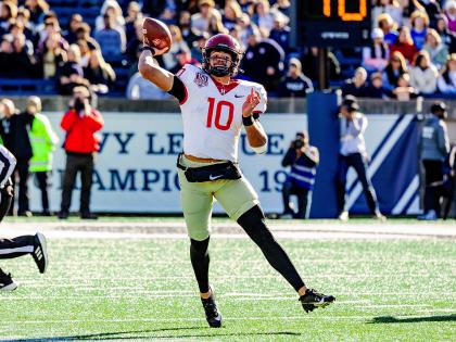 Harvard player throws ball