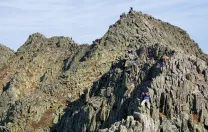 Hikers in Baxter State Park tackle the craggy rocks that form Mount Katahdin’s famous Knife Edge…