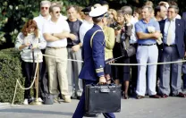 A military aide to President George H.W. Bush carries the &ldquo;nuclear briefcase,&rdquo; cabled to his wrist, in 1991.