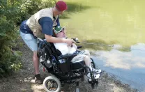 Tim Stevens, a longtime patient, fishes with his stepfather.